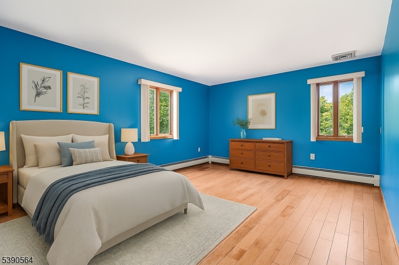 8 Cambridge Road Totowa, NJ 07512 - Photo 18 of 35 a bedroom with bed and window