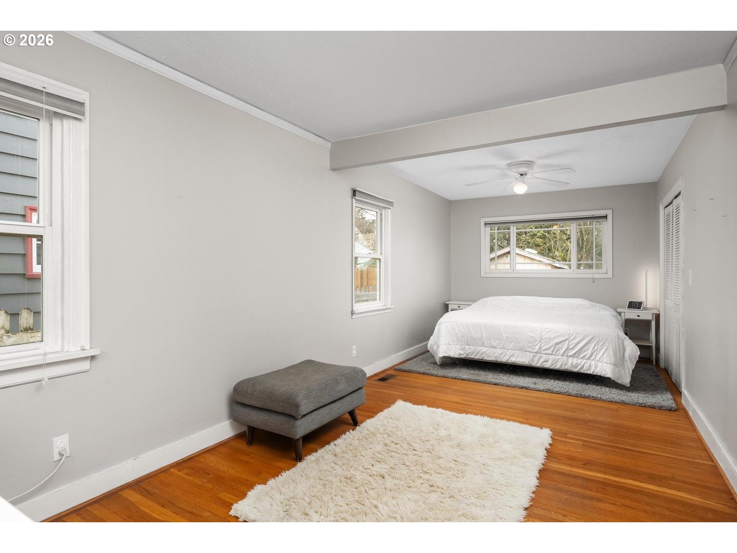 3825 Northeast 63rd Avenue Portland, OR 97213 - Photo 14 of 43 a bedroom with a bed and window