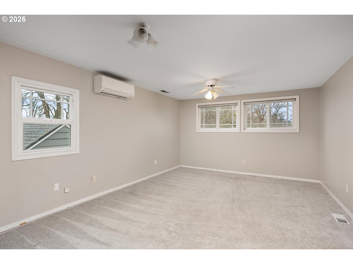 3825 Northeast 63rd Avenue Portland, OR 97213 - Photo 23 of 43 a view of an empty room with a window