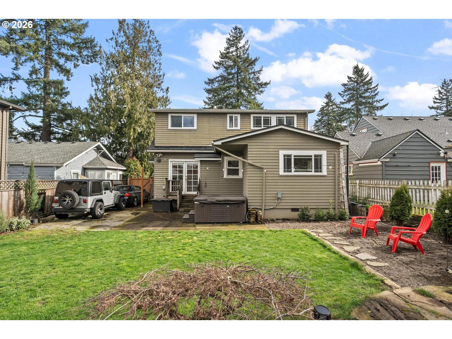 3825 Northeast 63rd Avenue Portland, OR 97213 - Photo 41 of 43 a front view of a house with a yard and trees