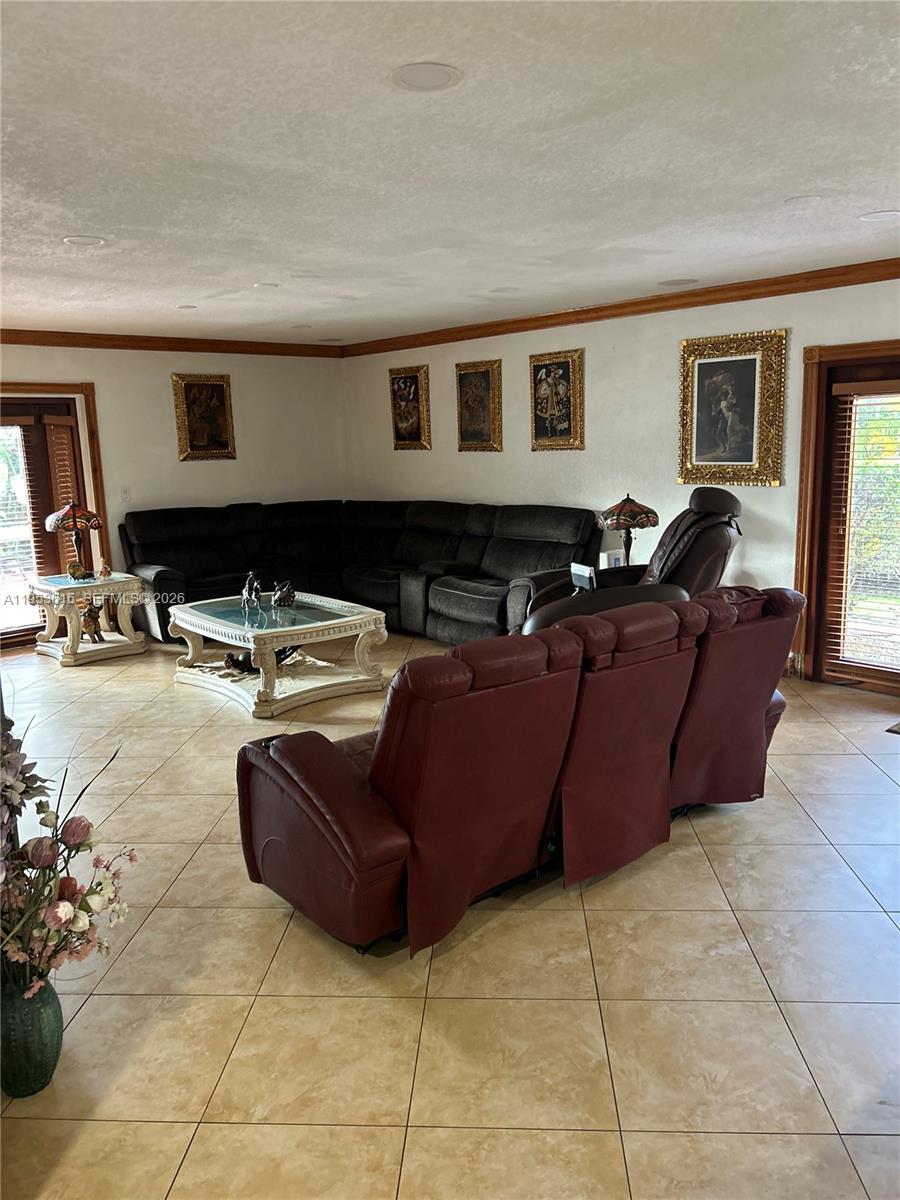 2600 Southwest 126th Avenue Miami, FL 33175 - Photo 11 of 23 a living room with furniture and a window