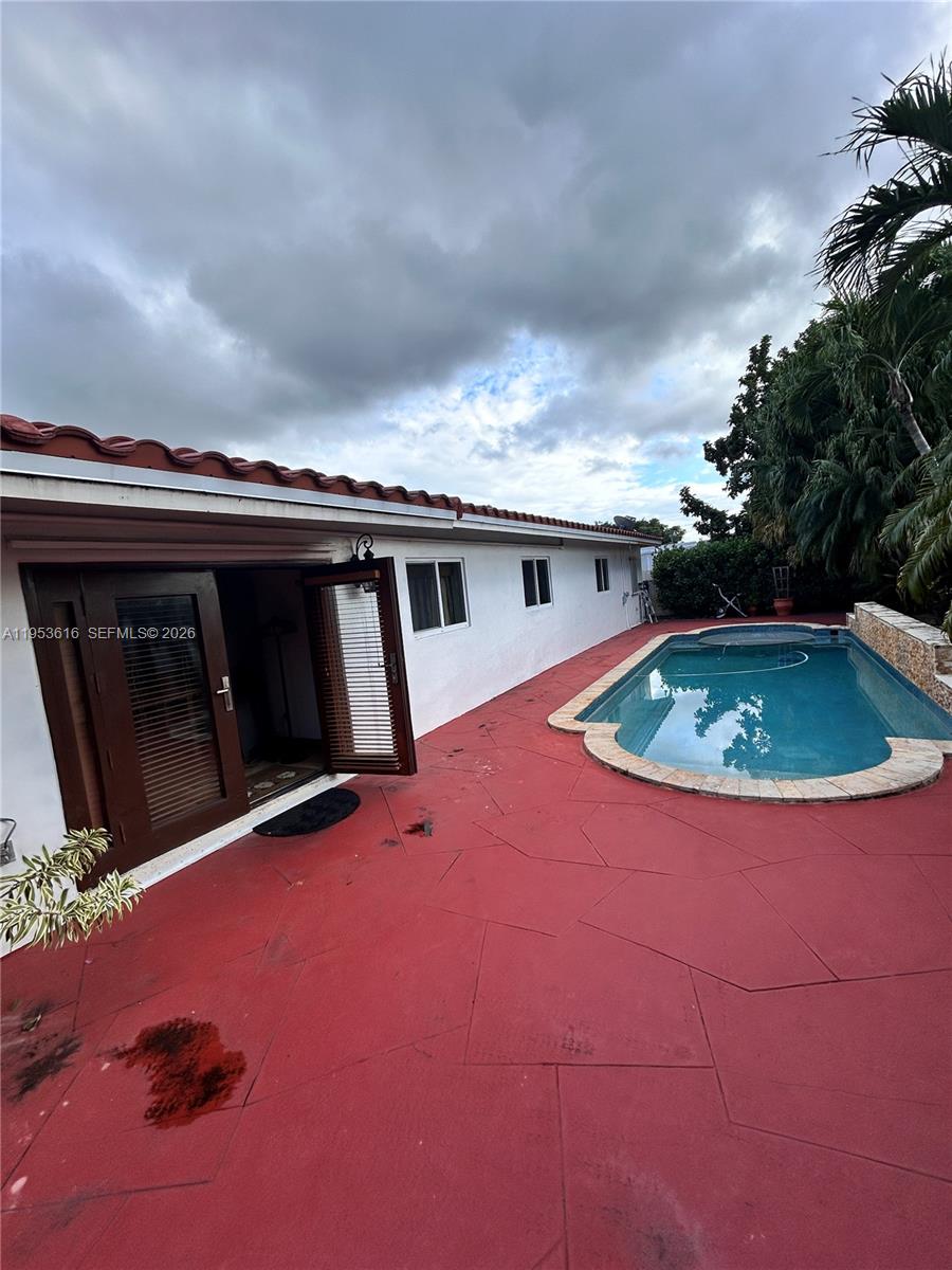 2600 Southwest 126th Avenue Miami, FL 33175 - Photo 21 of 23 an outdoor space with pool and furniture