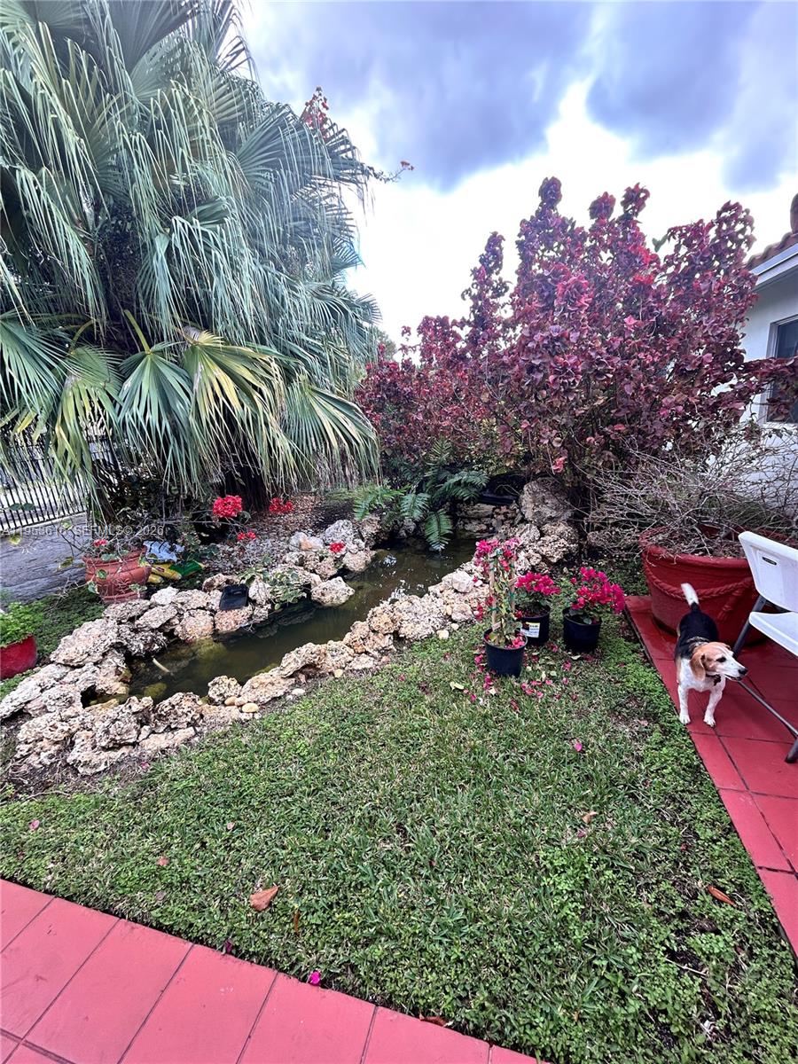 2600 Southwest 126th Avenue Miami, FL 33175 - Photo 3 of 23 a view of a yard with cars