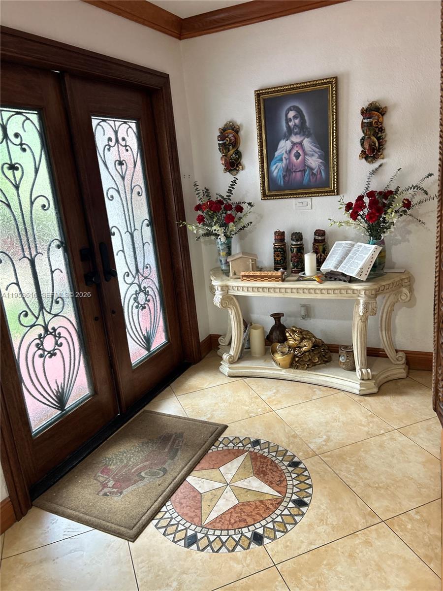 2600 Southwest 126th Avenue Miami, FL 33175 - Photo 4 of 23 a view of sitting area with furniture and rug