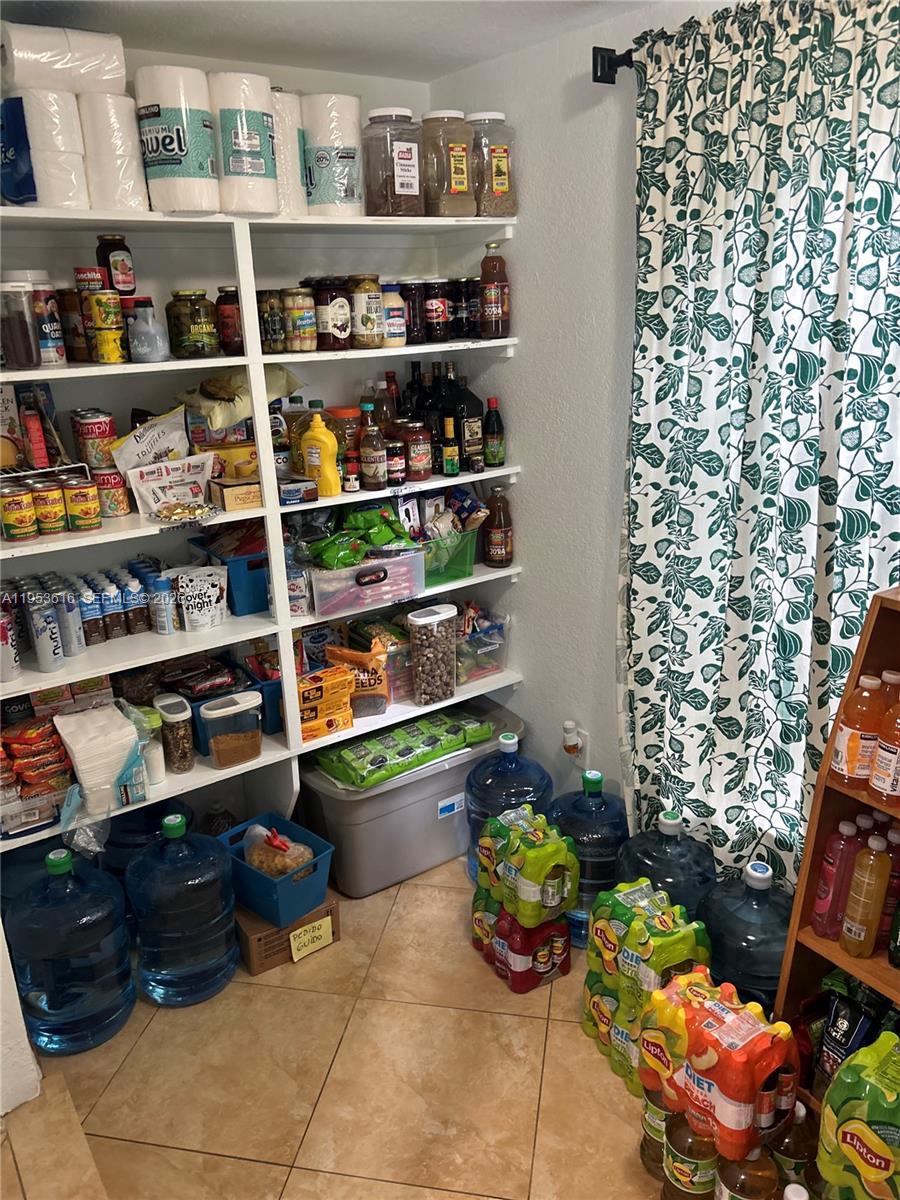 2600 Southwest 126th Avenue Miami, FL 33175 - Photo 9 of 23 a room with lots of different kinds of flowers