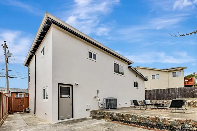 a view of a house with a patio