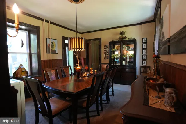 a view of a dining room with furniture