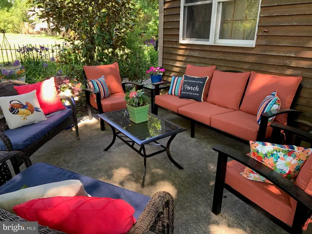 a outdoor space with tables and chairs