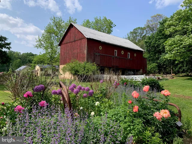 a view of a pathway in front of house