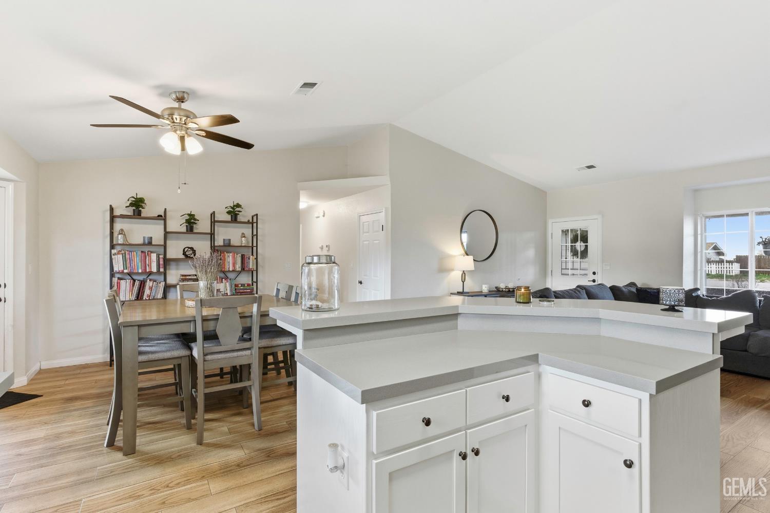 Undisclosed Address Tehachapi, CA 93561 - Photo 14 of 40 a view of a kitchen counter space a sink appliances and dining room