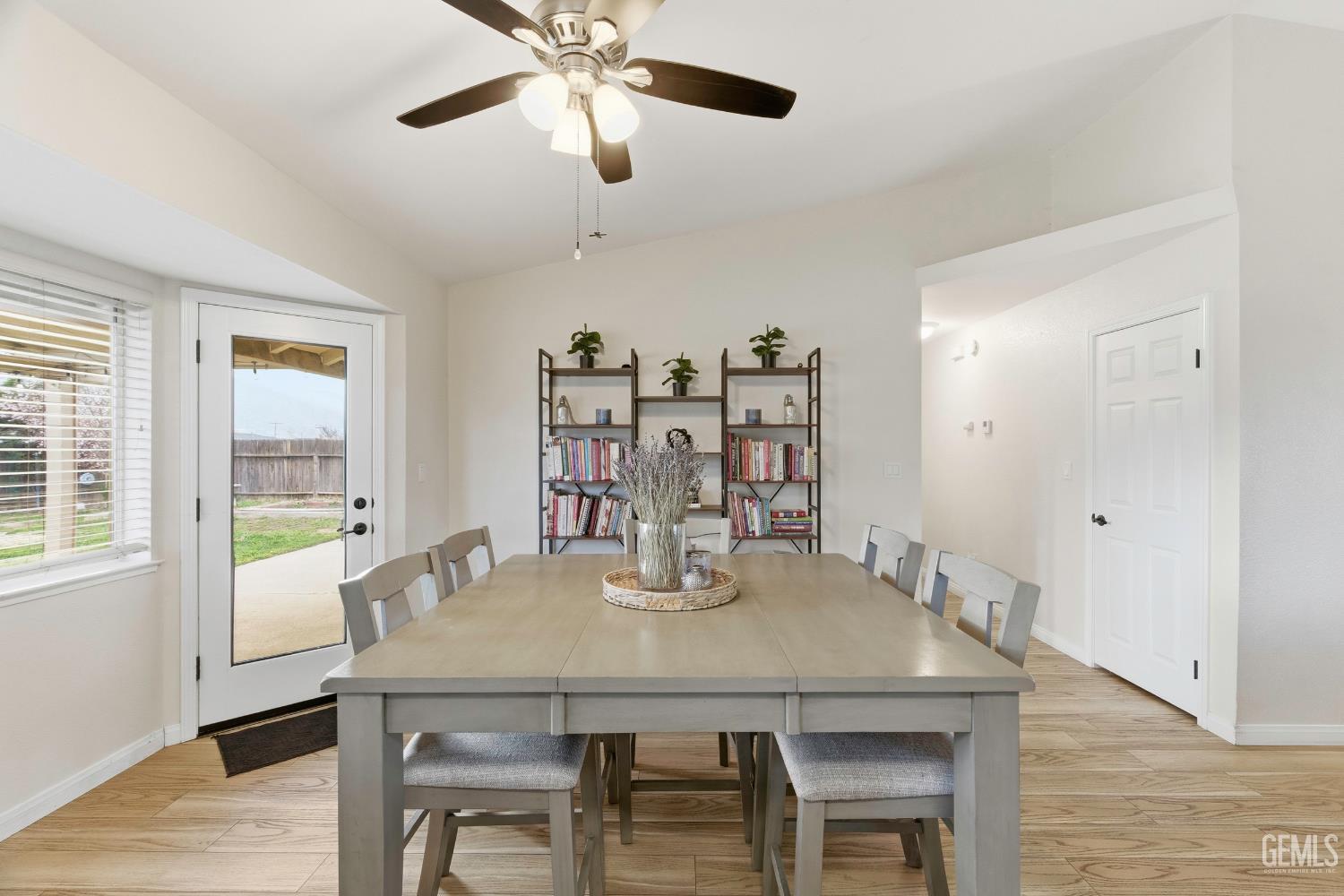 Undisclosed Address Tehachapi, CA 93561 - Photo 15 of 40 a view of a dining room with furniture and wooden floor