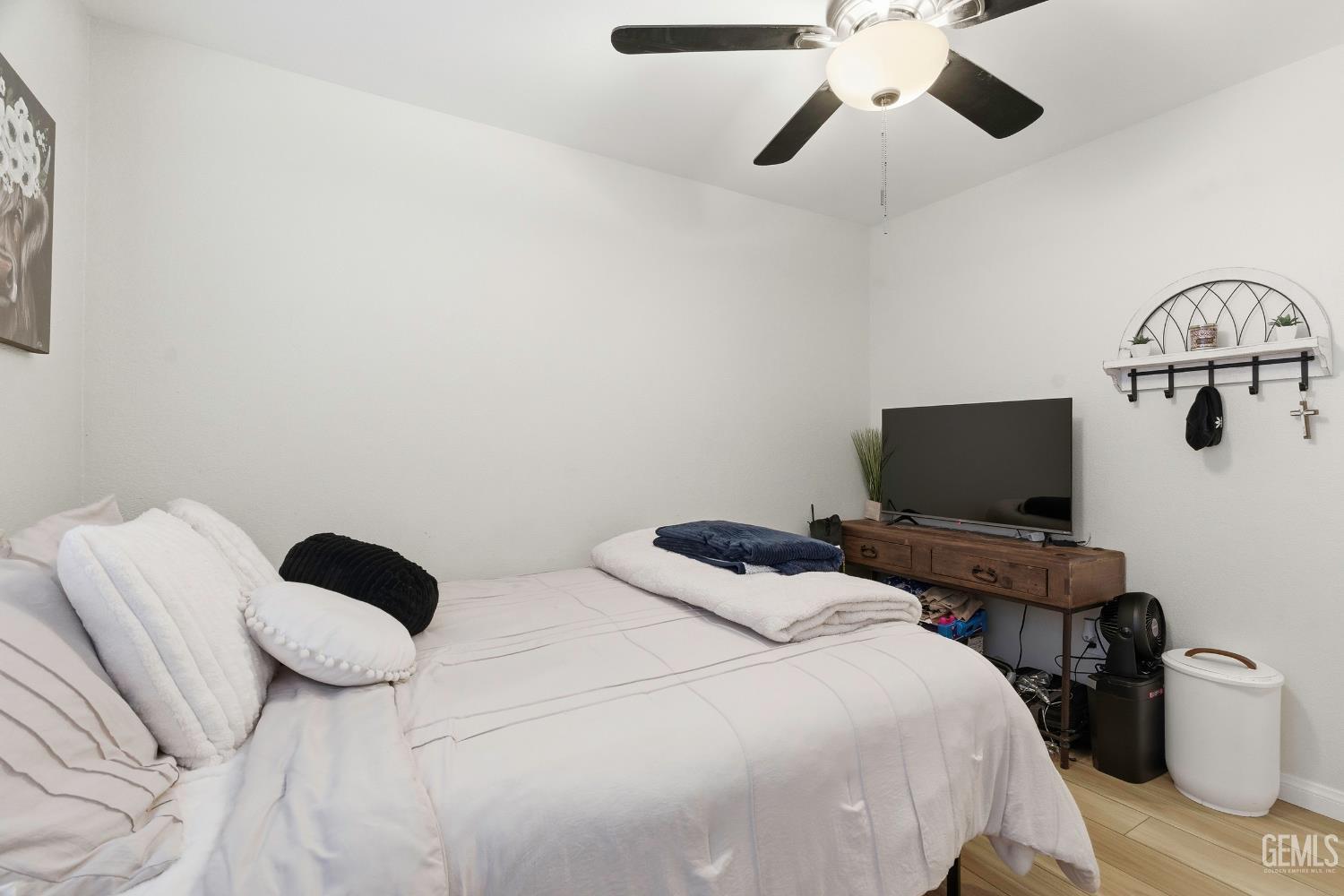 Undisclosed Address Tehachapi, CA 93561 - Photo 20 of 40 a bedroom with a bed and a flat screen tv