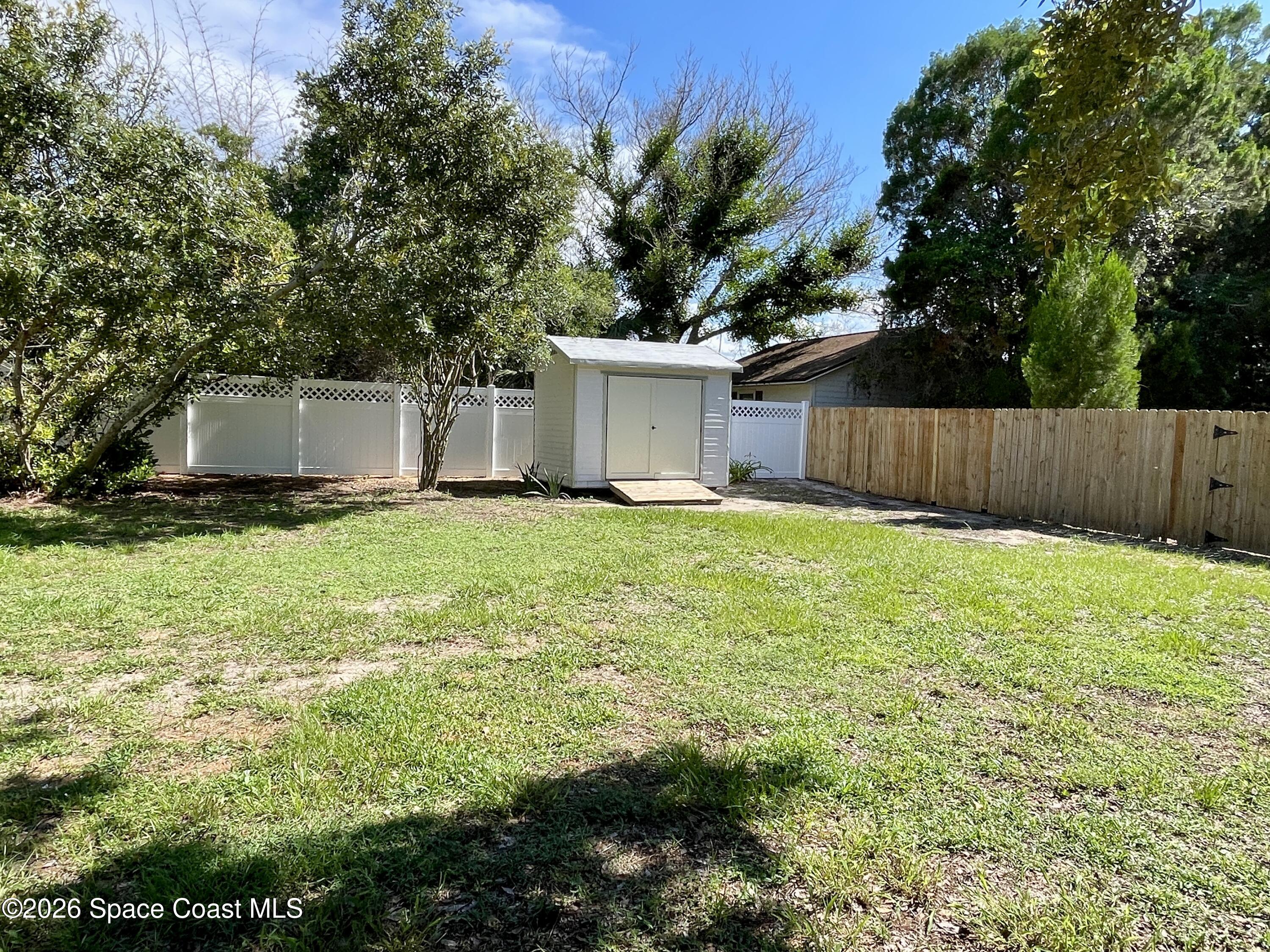 7260 Blue Shore Road Grant, FL 32949 - Photo 22 of 23 Back yard & shed