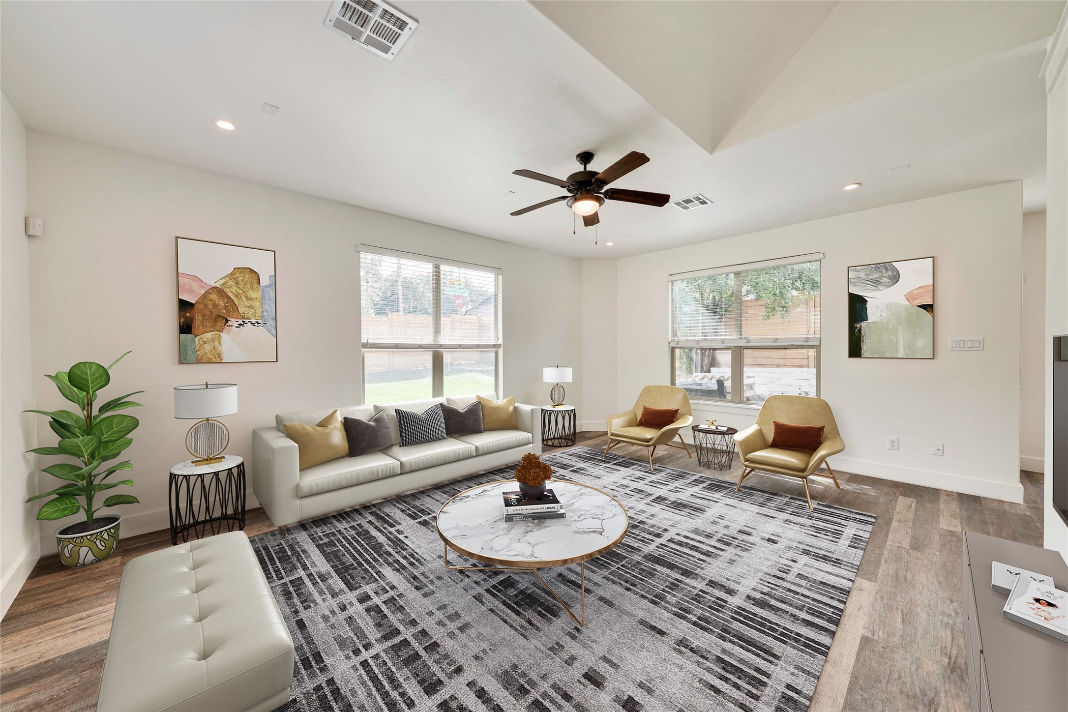 4124 Valley View Road, Unit 4A & 4B Austin, TX 78704 - Photo 23 of 40 Relax in a generously sized living room, featuring a tray ceiling and light wood-look flooring.