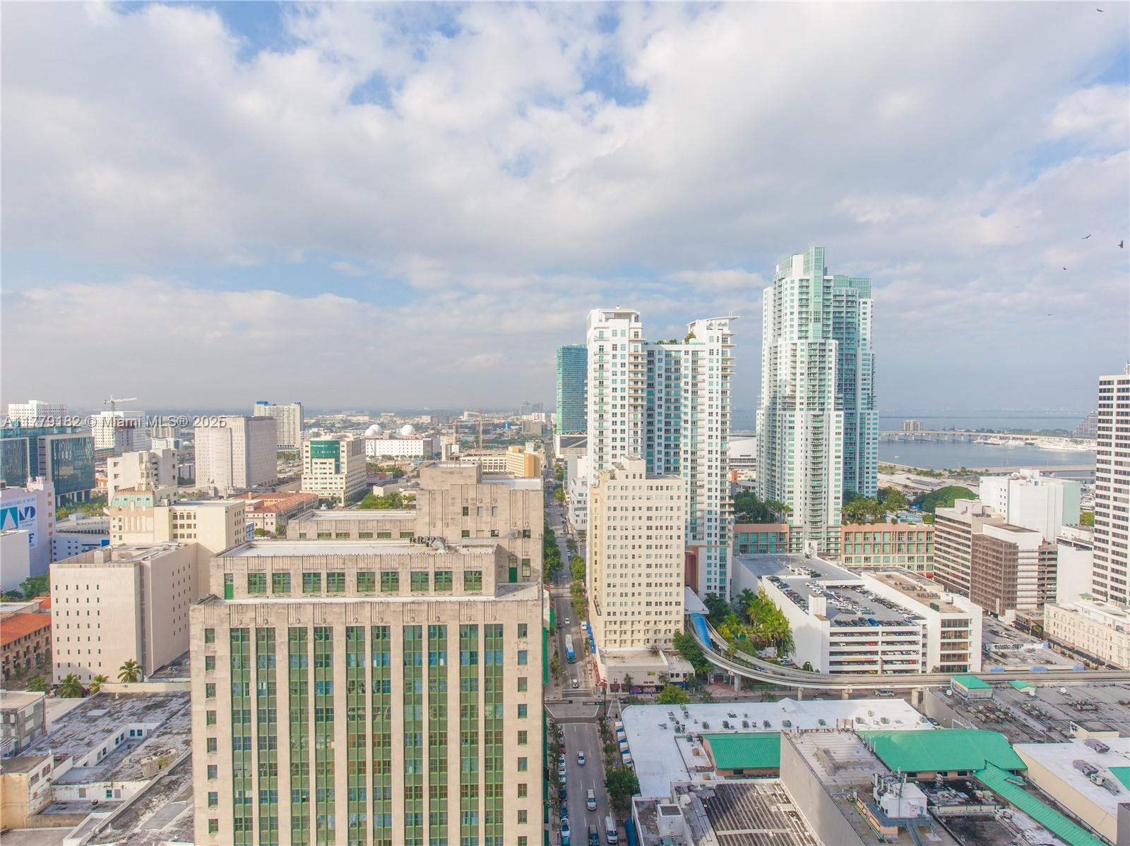 151 Southeast 1st Street, Unit 2802 Miami, FL 33131 - Photo 14 of 19 a view of a city with tall buildings