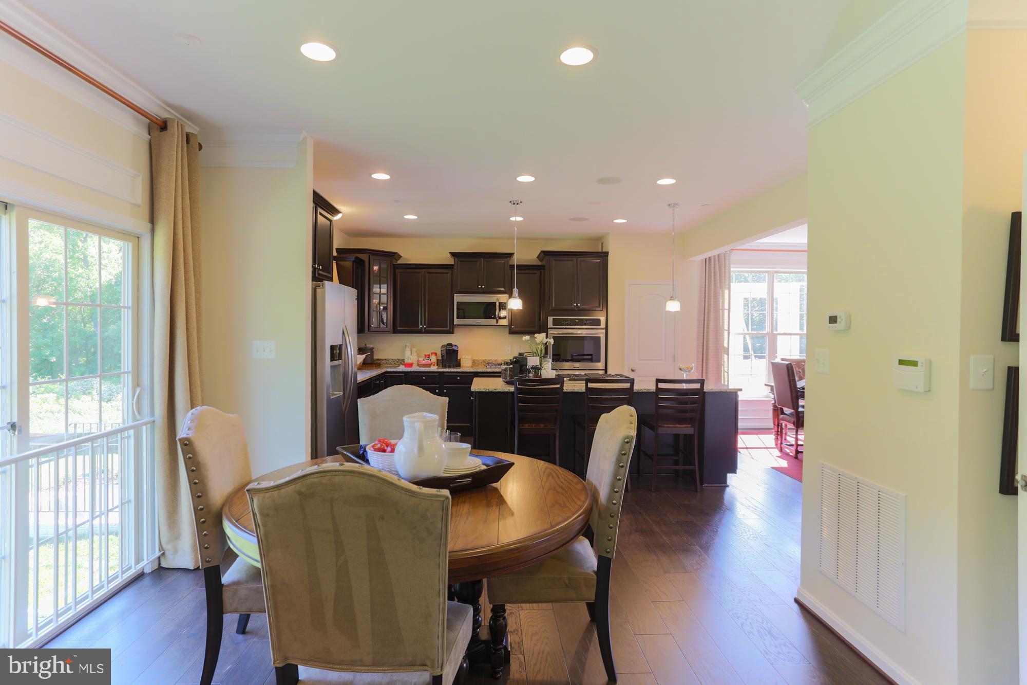 8111 Ridgely Loop Severn, MD 21144 - Photo 17 of 30 Breakfast Room to Kitchen