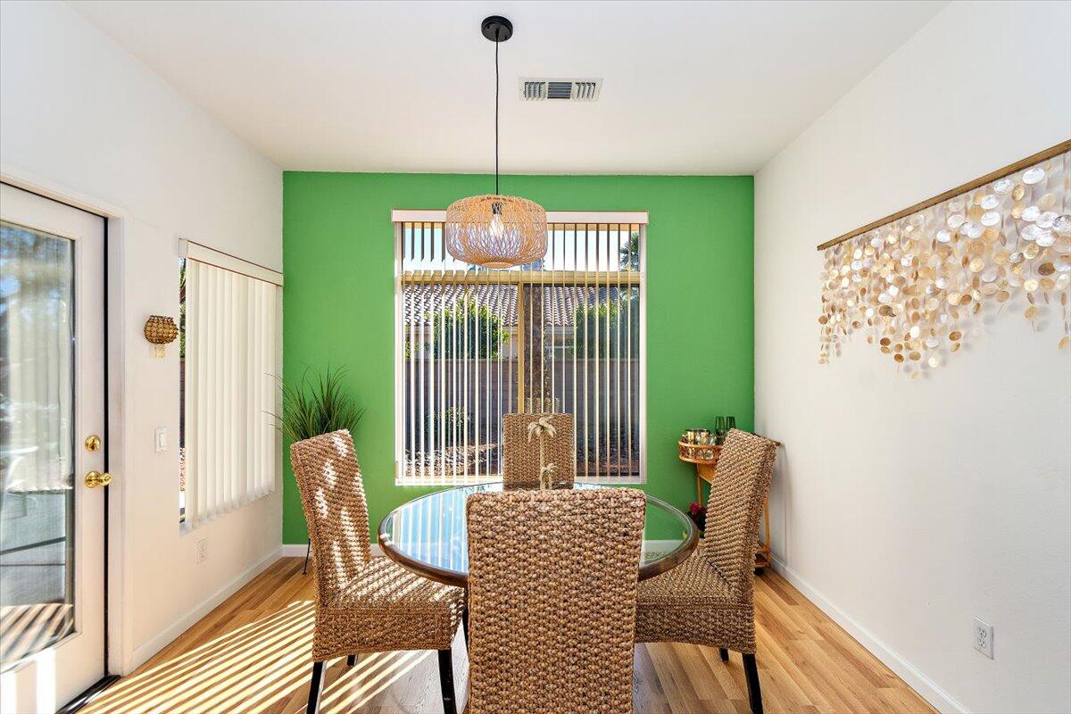 78995 Champagne Lane Palm Desert, CA 92211 - Photo 10 of 26 a view of a room with furniture and windows