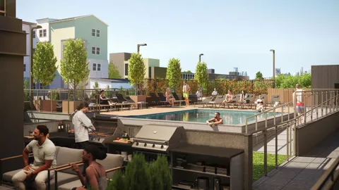 a view of balcony with outdoor seating and city view