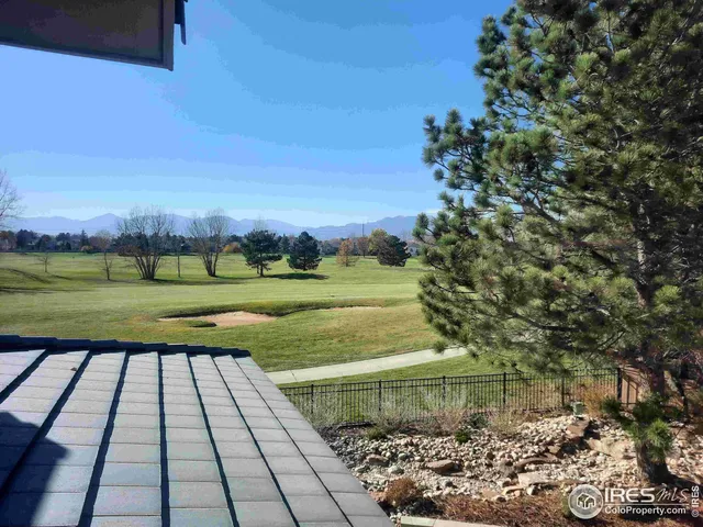 a view of a backyard with a garden