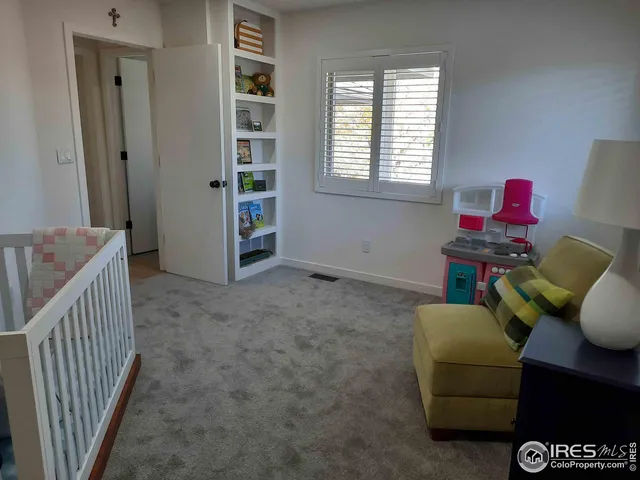 a livingroom with furniture and a window