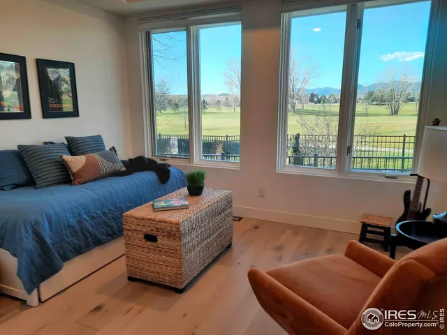 a bathroom with a toilet a sink and shower