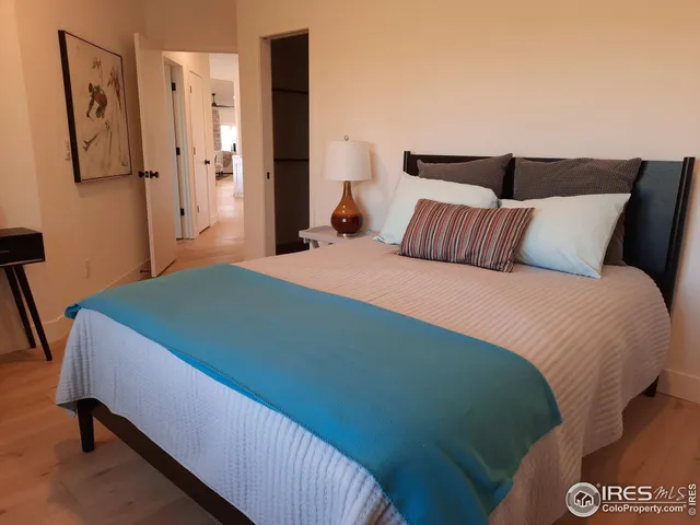 a kitchen with stainless steel appliances kitchen island granite countertop a sink and cabinets