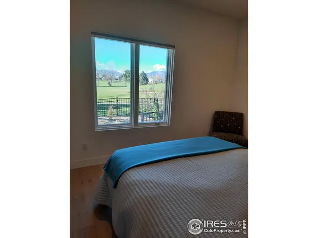 a view of a lake from a balcony