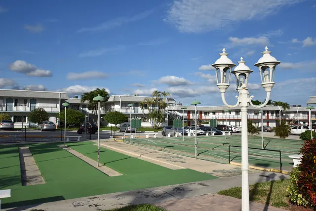 a front view of a building with street view