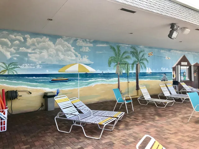 a chair and table sitting in a room