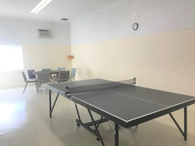 a workspace with furniture and wooden floor