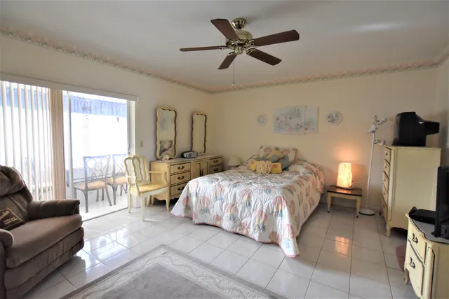 a bed room with a bed and a couch