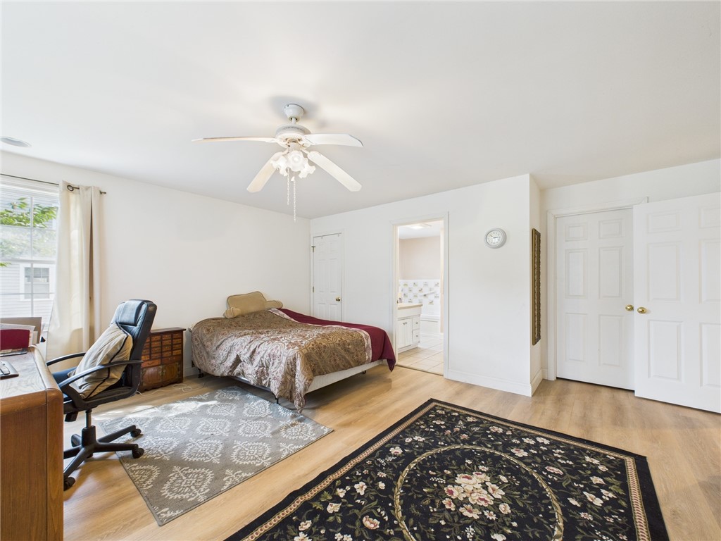 56 Wanda Street Narragansett, RI 02882 - Photo 14 of 25 Spacious first floor primary with walk in closet and ensuite bath