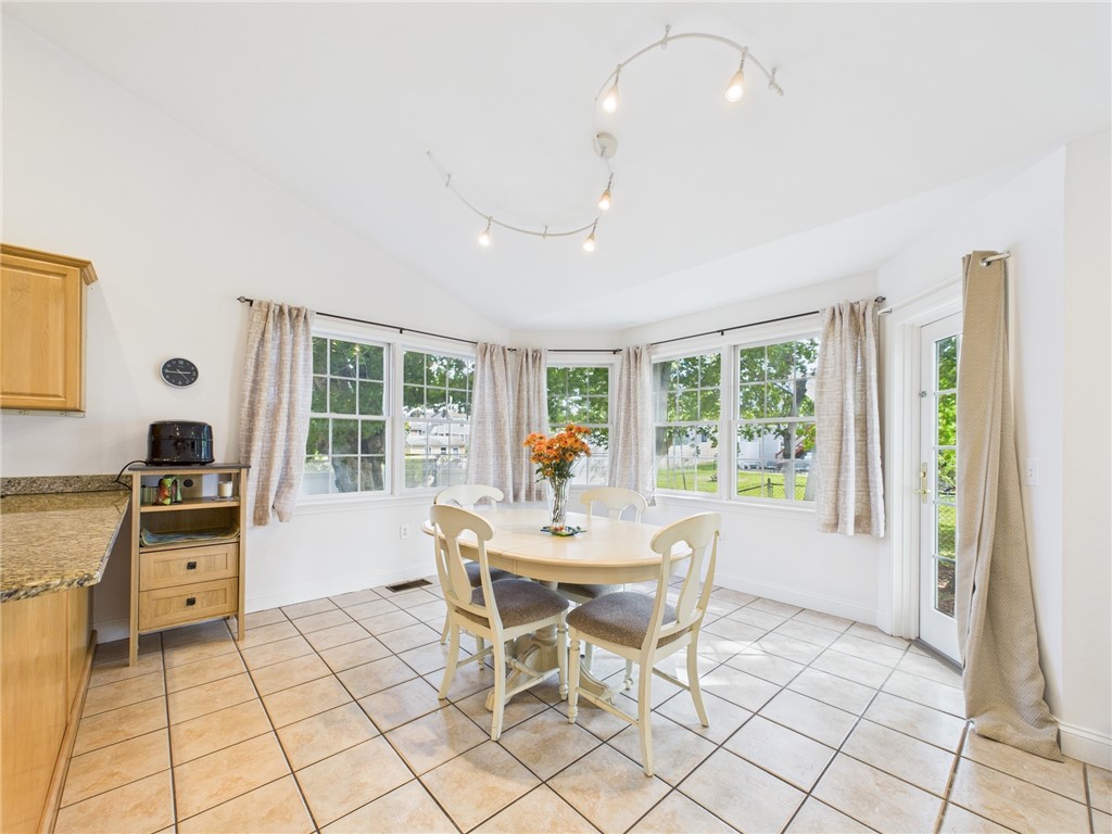 56 Wanda Street Narragansett, RI 02882 - Photo 5 of 22 Lots of windows in the dining area