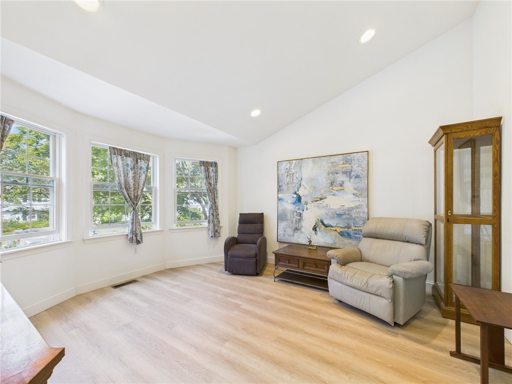 56 Wanda Street Narragansett, RI 02882 - Photo 8 of 22 Den with cathedral ceilings could be a formal dining room