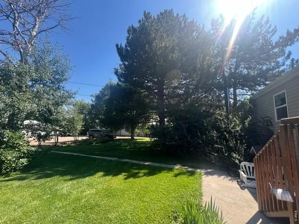 a view of a lake from a yard