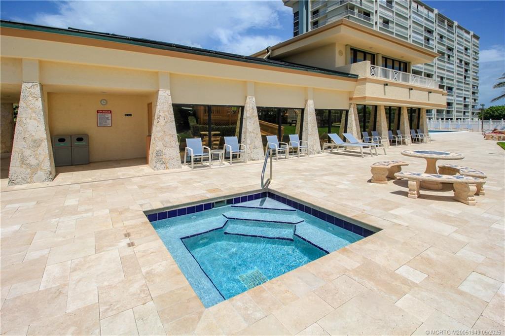 10680 South Ocean Drive, Unit 705 Jensen Beach, FL 34957 - Photo 31 of 45 a view of a building with sitting area