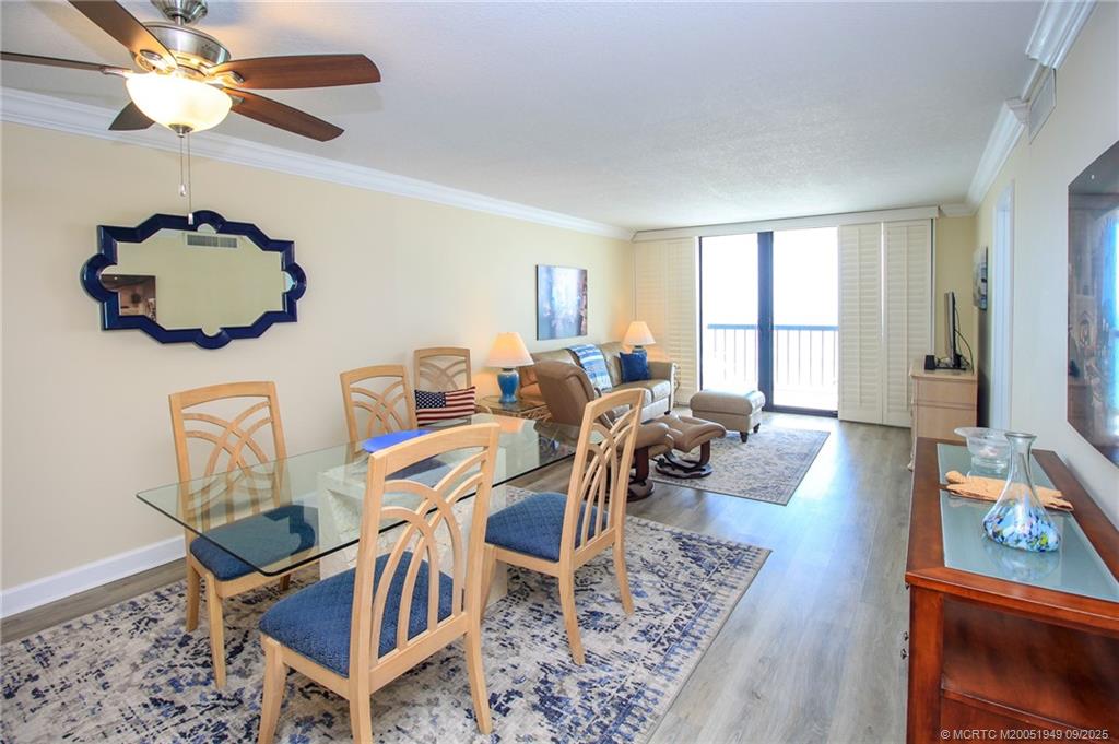 10680 South Ocean Drive, Unit 705 Jensen Beach, FL 34957 - Photo 7 of 45 a living room with furniture and a window