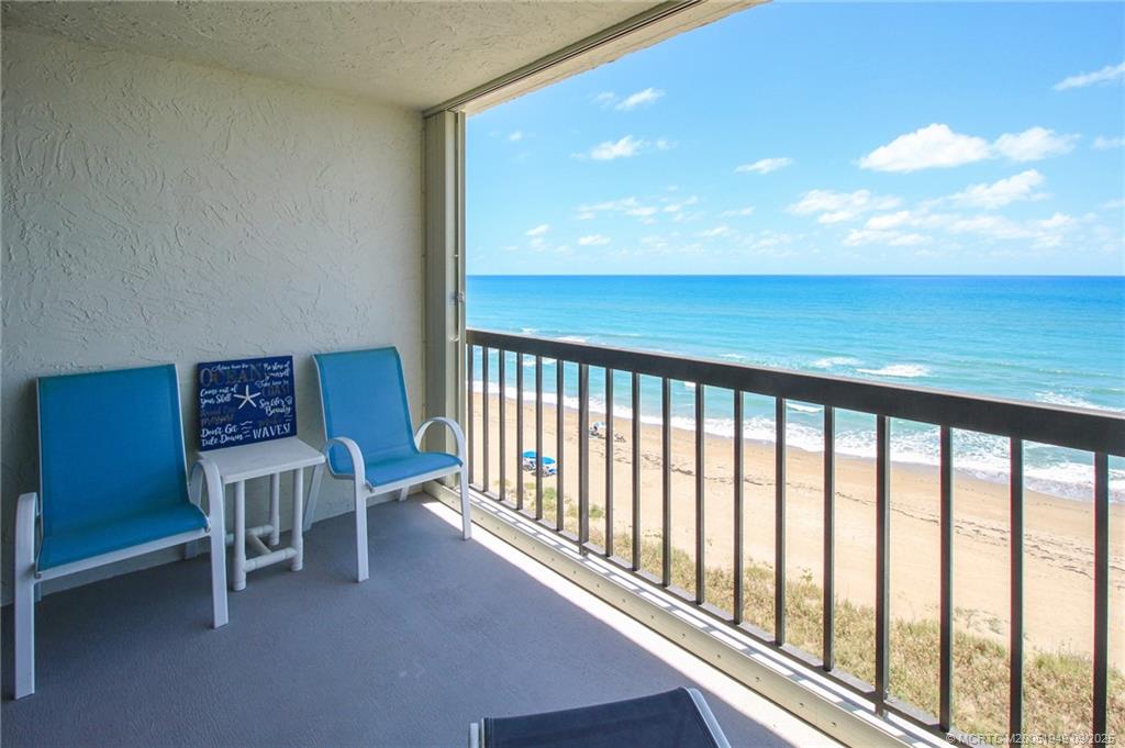 10680 South Ocean Drive, Unit 705 Jensen Beach, FL 34957 - Photo 9 of 45 a view of a two chairs in the balcony