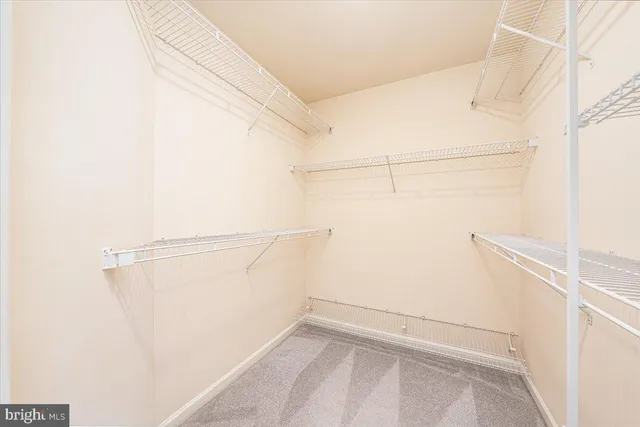 a bathroom with a tub and a shower