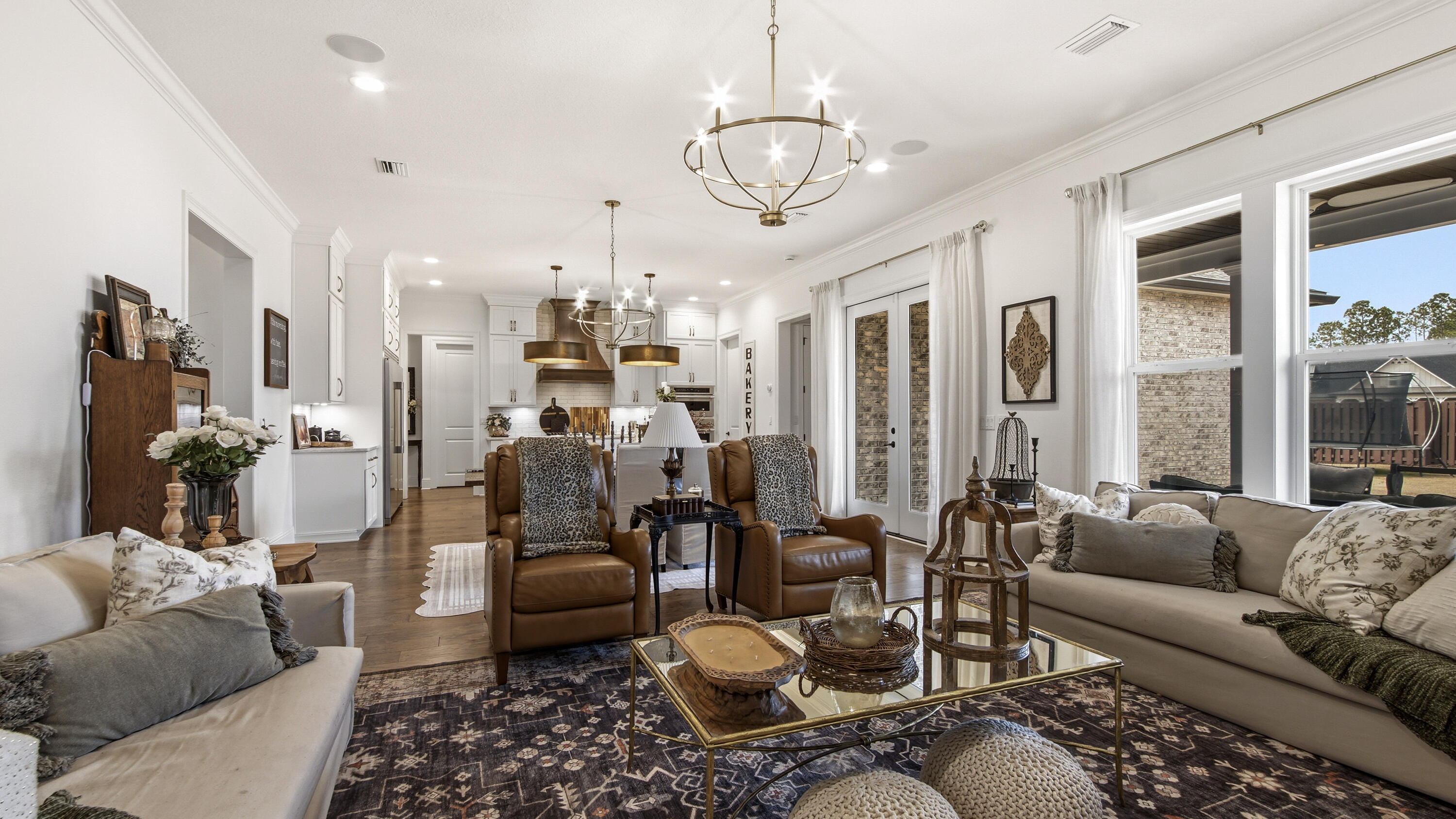 33 Caymus Cove Freeport, FL 32439 - Photo 10 of 144 a living room with furniture or outdoor view and a chandelier
