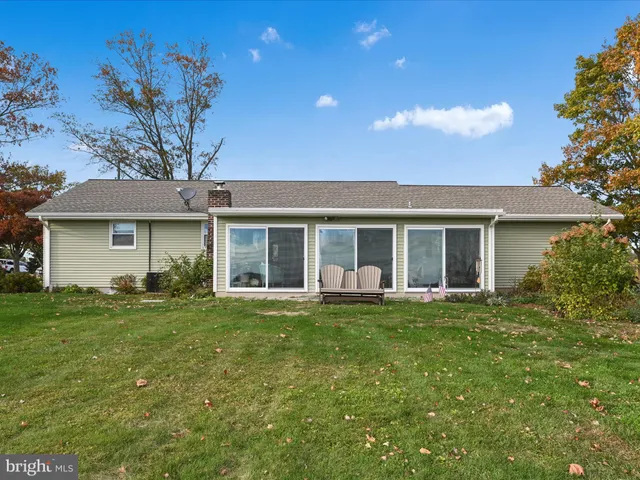 front view of a house with a garden