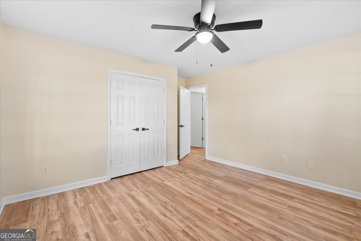 126 Waterfront Way Warner Robins, GA 31093 - Photo 22 of 60 wooden floor in an empty room