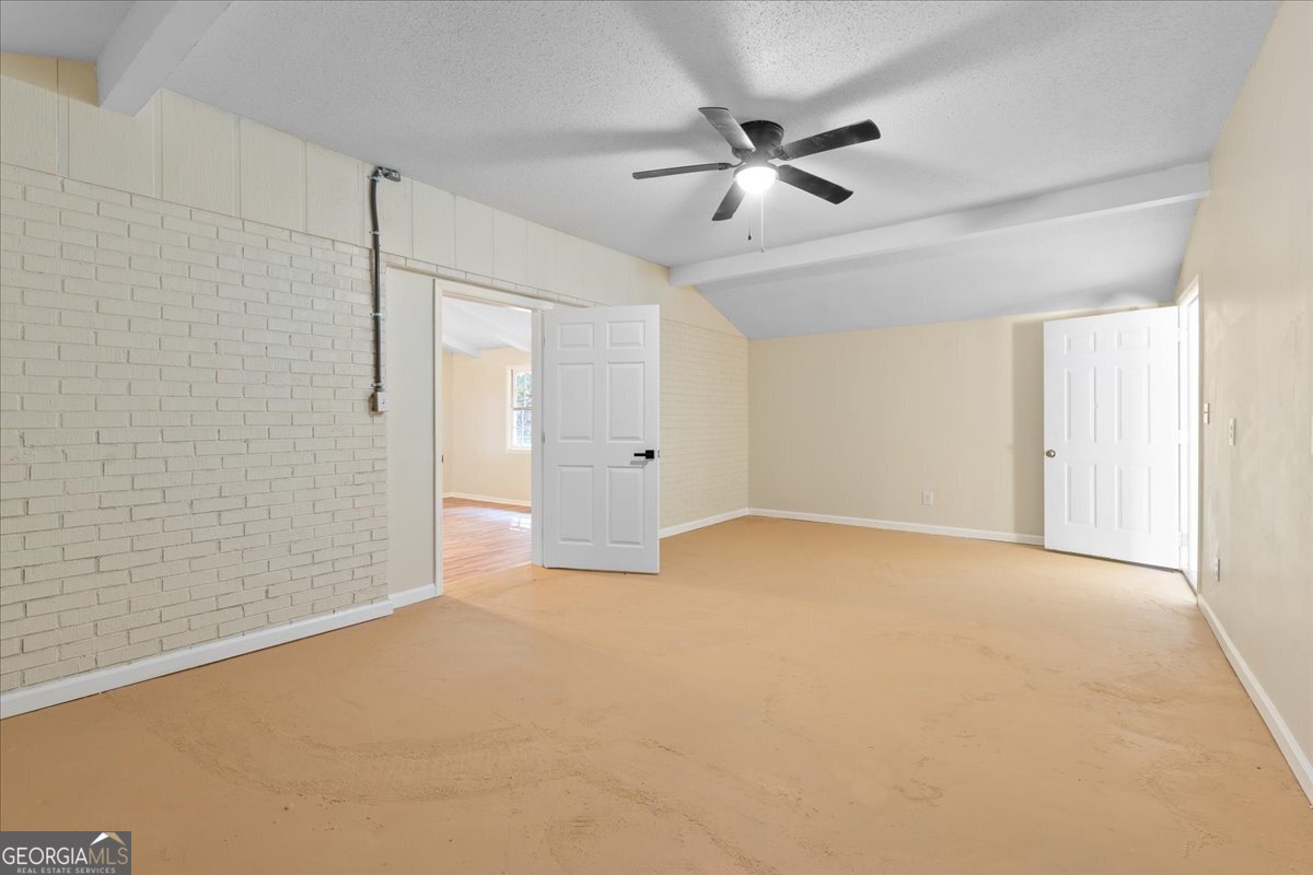 126 Waterfront Way Warner Robins, GA 31093 - Photo 50 of 60 a view of an empty room with chandelier fan