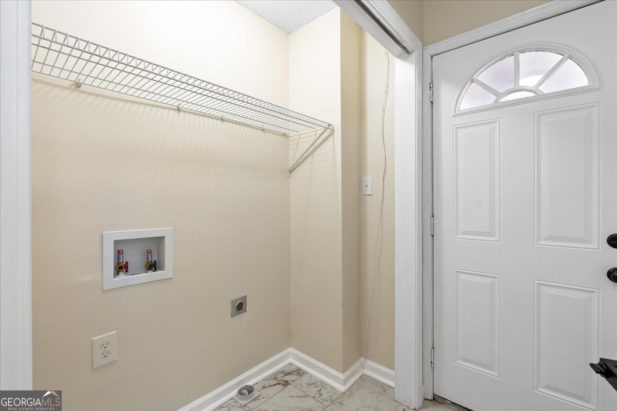 126 Waterfront Way Warner Robins, GA 31093 - Photo 53 of 60 a bathroom with a bathtub and shower