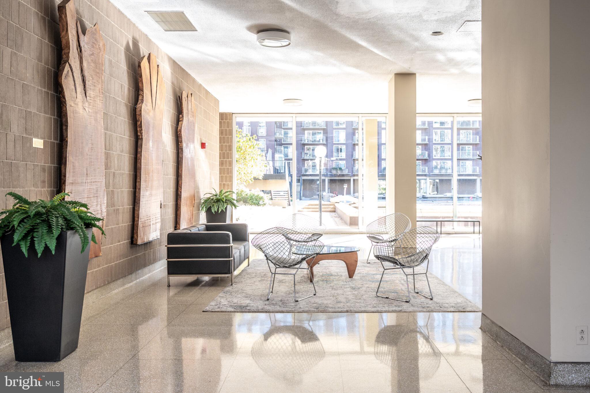 560 N Street Southwest, Unit N503 Washington, DC 20024 - Photo 25 of 35 a dining room with furniture and large windows