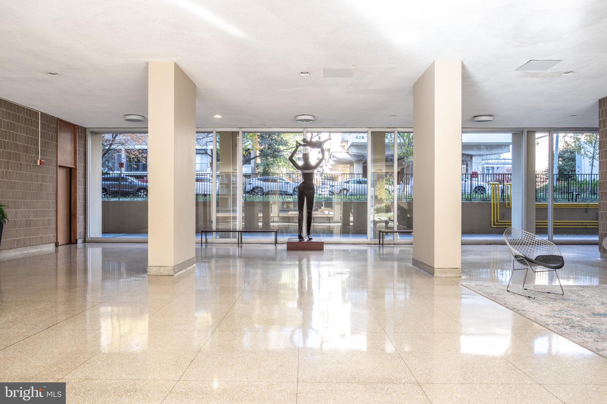560 N Street Southwest, Unit N503 Washington, DC 20024 - Photo 27 of 35 a view of a hall way with kitchen and furniture