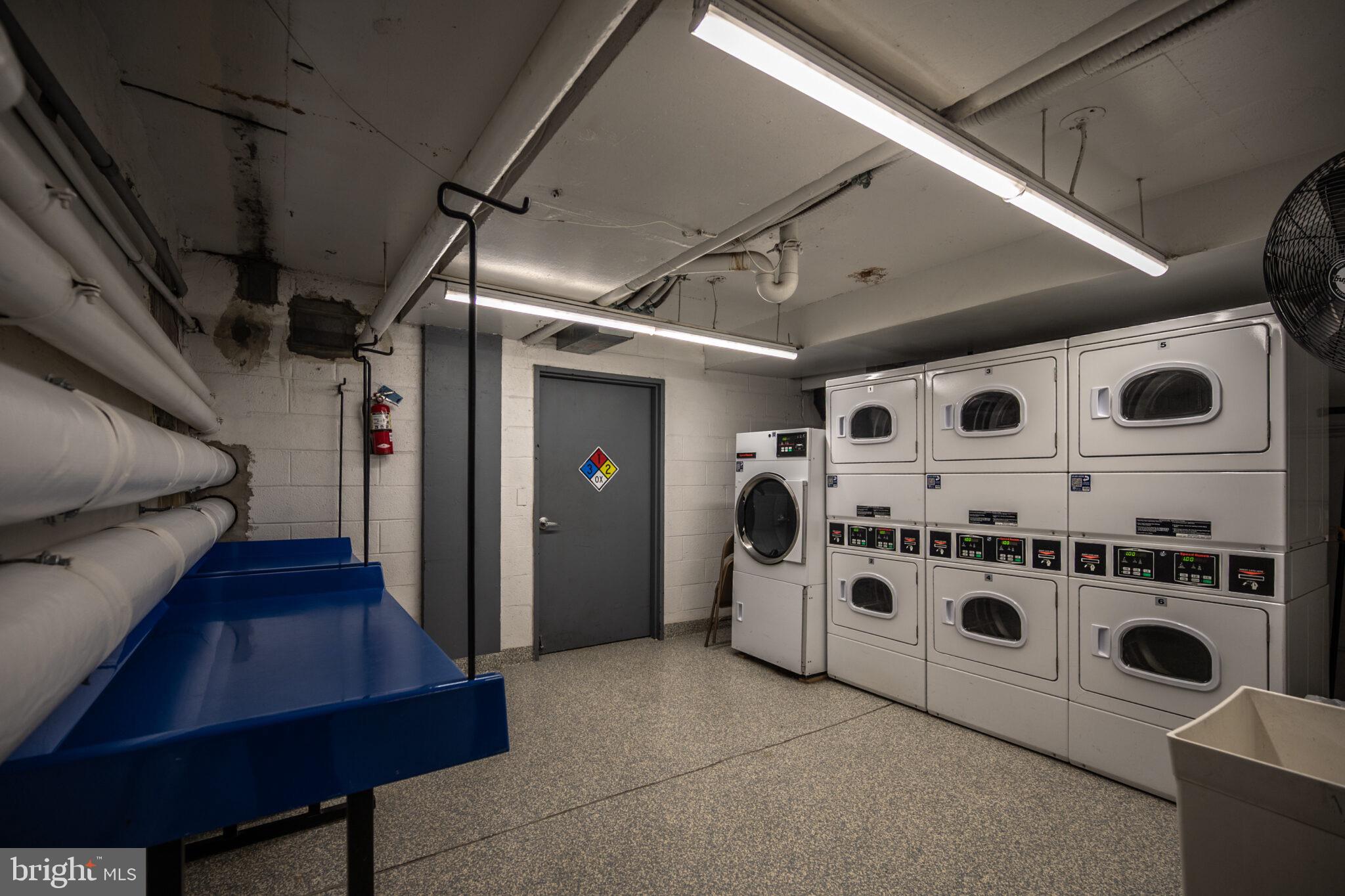 560 N Street Southwest, Unit N503 Washington, DC 20024 - Photo 29 of 35 a utility room with dryer and washer