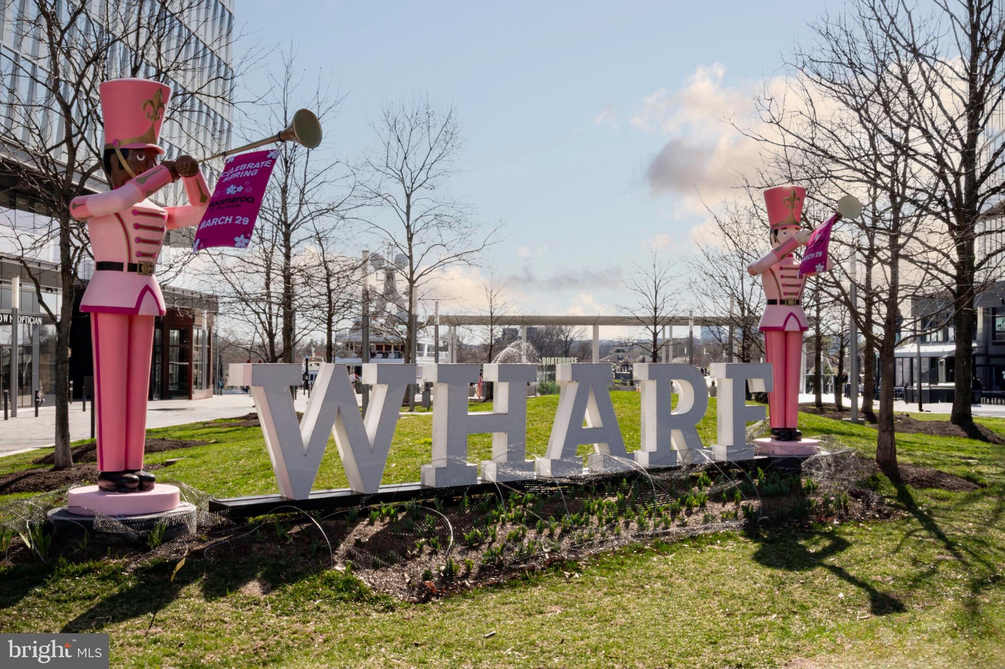 560 N Street Southwest, Unit N503 Washington, DC 20024 - Photo 35 of 35 a front view of a building with retail shops