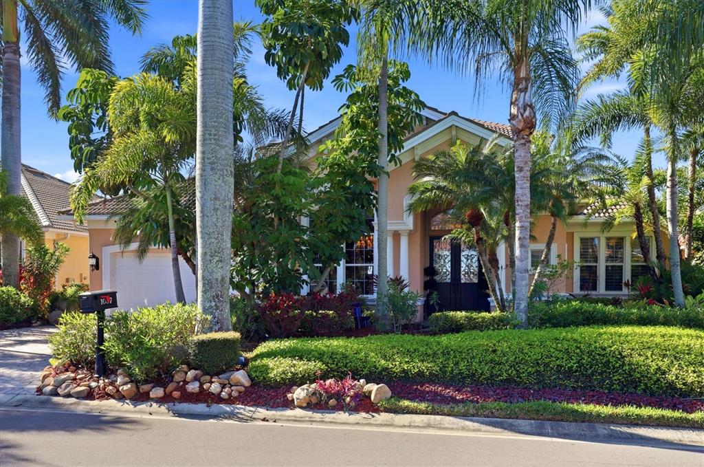 front view of a house with a garden