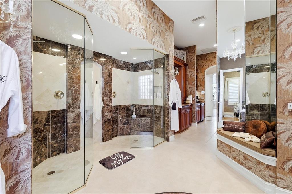 1007 3rd Street East Palmetto, FL 34221 - Photo 18 of 44 a bathroom with a tub shower and sink